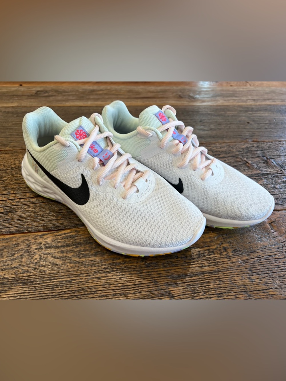 Nike Revolution 6 Sneakers with Pastel Accents and Black Swoosh